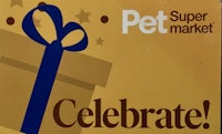 the pet super market celebrates with a blue ribbon